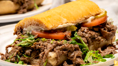 The Spotted Cat Music Club signature dishes BBQ Shrimp & Grits
Grilled Ribeye
Roast Beef Po'boy